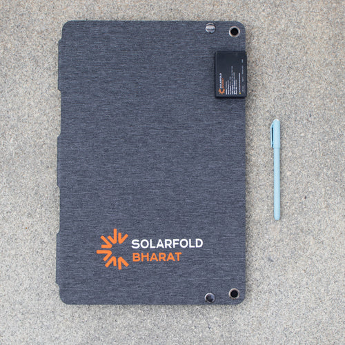Solarfold panel with a pen beside it